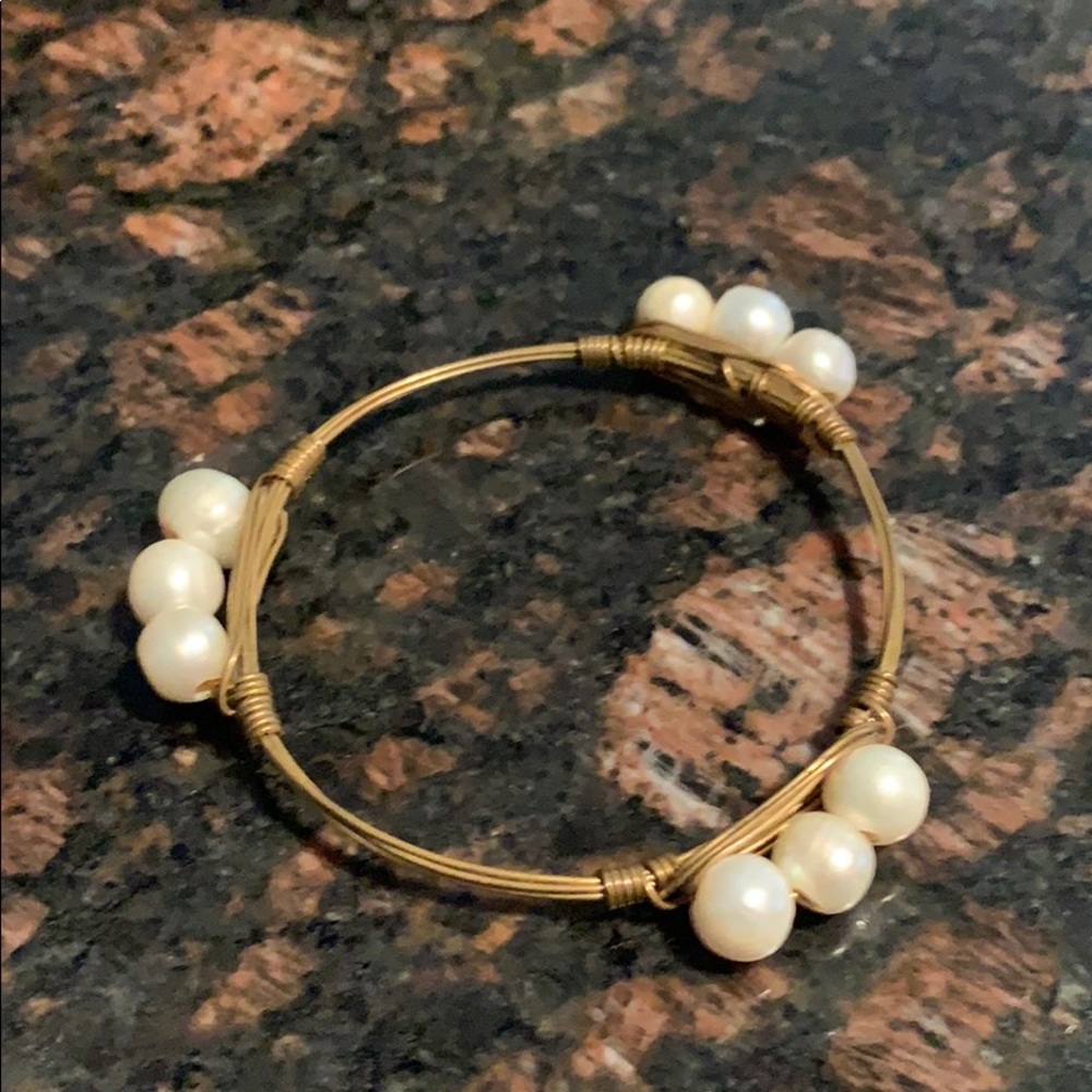 Gold wire bangle bracelet with faux pearls